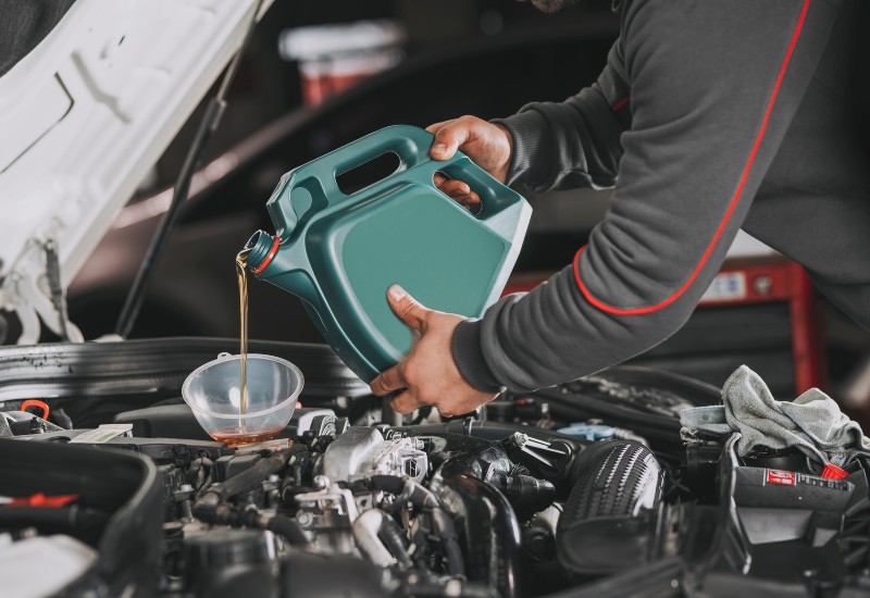 Pouring vital car fluids into a vehicle engine in Texas & Arkansas