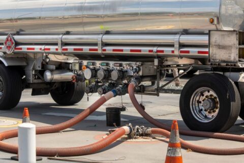 Truck delivering bulk fuel to a business in Texas & Arkansas