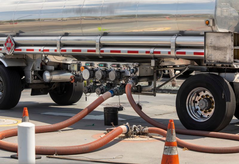 Truck delivering bulk fuel to a business in Texas & Arkansas