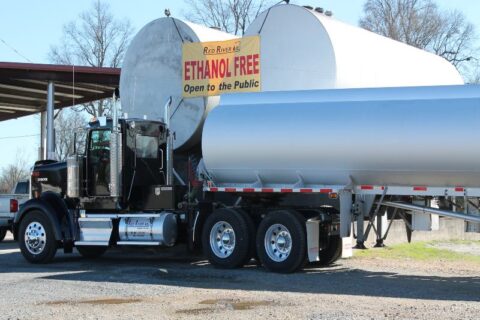 Red River Oil Company's Truck Delivering Fuel to a Commercial Business in Texas & Arkansas