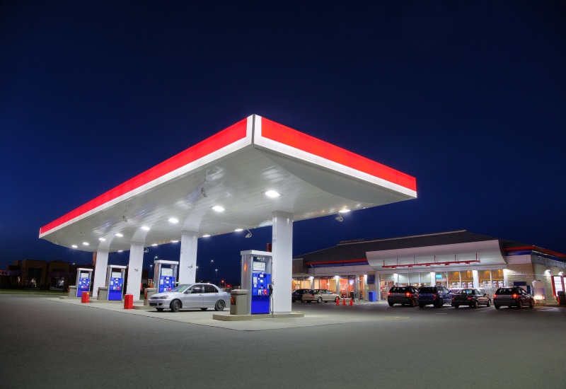 Retail Gas Station Filling Up a Car in Texas & Arkansas